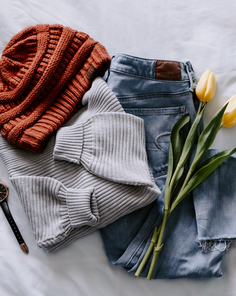 A folded dove-grey ribbed vintage jumper