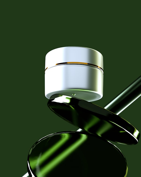A mineral SPF jar on a green surface