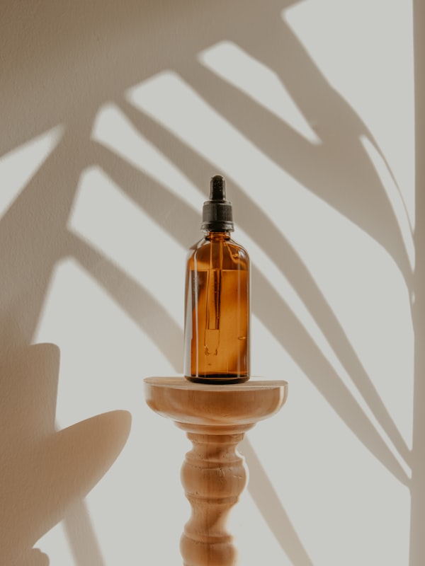 An amber glass bottle in soft light