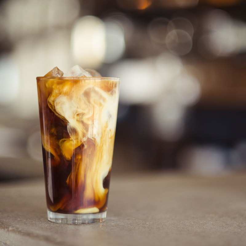 Iced cold brew served over ice on the café counter