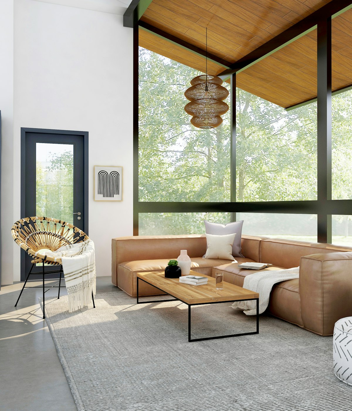 Double-height living room with a wall of glass opening onto the canyon and a floating walnut staircase.