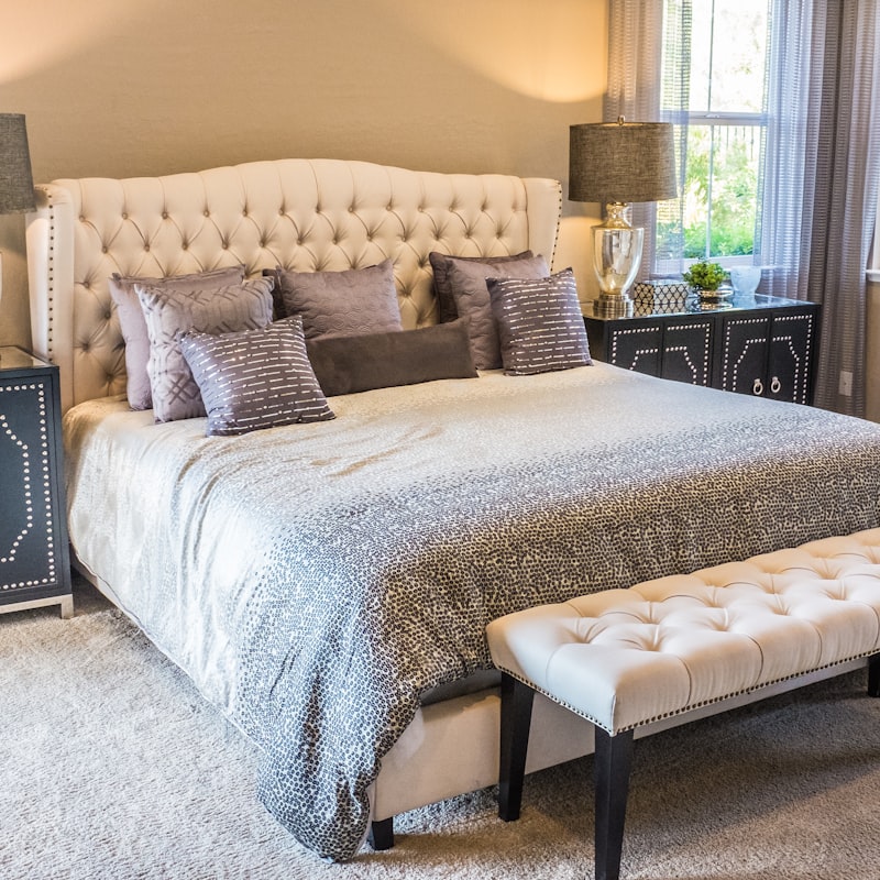 Primary bedroom suite with floor-to-ceiling glass and a private terrace.