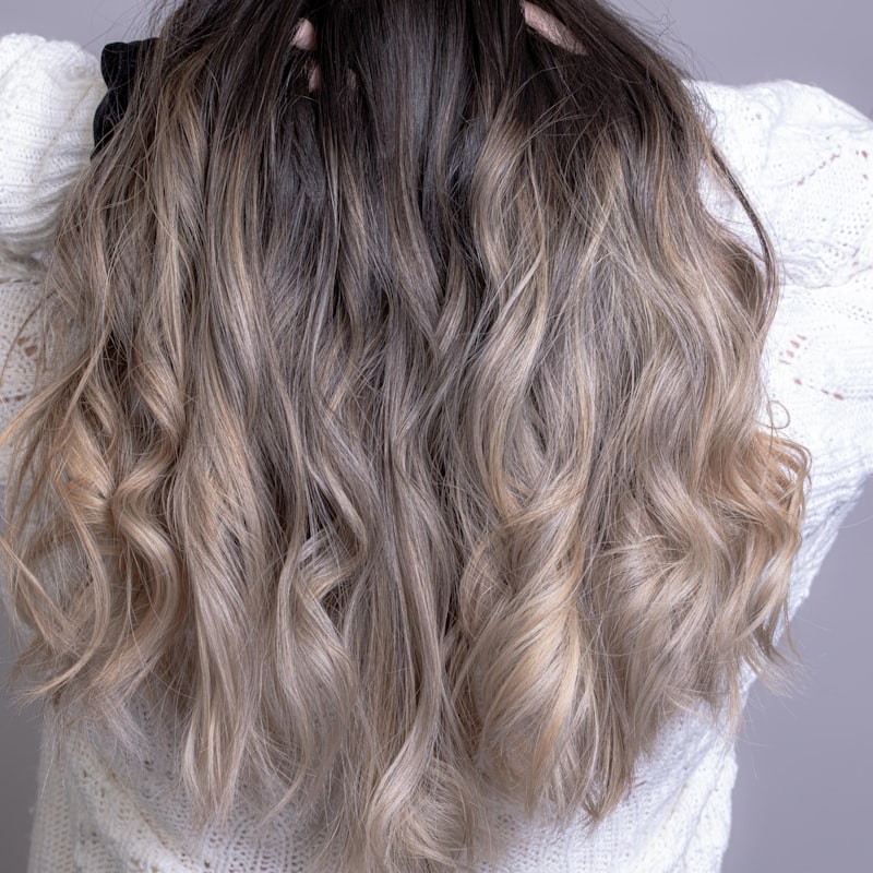 Cool-toned blonde with seamless root melt