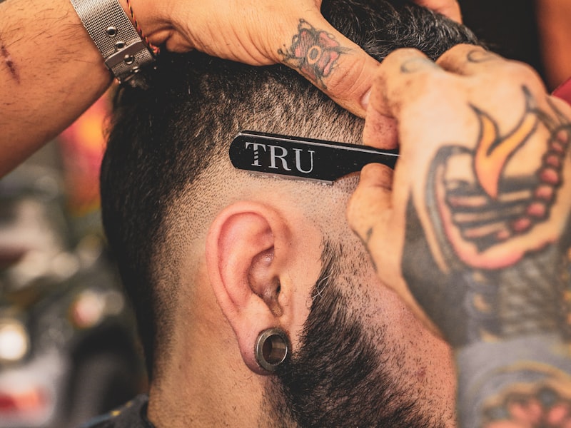 Sharp skin fade with textured top, freshly cut