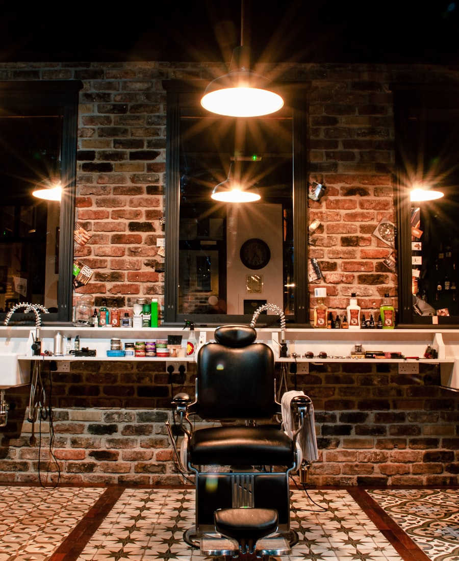 The warm, vintage interior of Ironhand Barber Co. with leather chairs and brass fittings