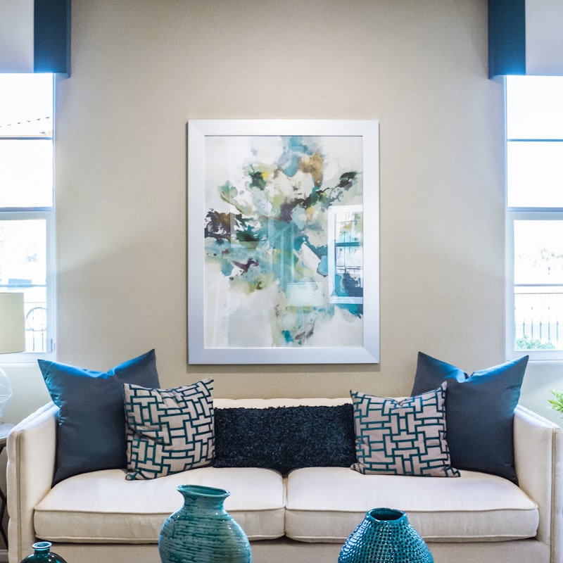Relaxation lounge with low seating, throws and dried botanicals