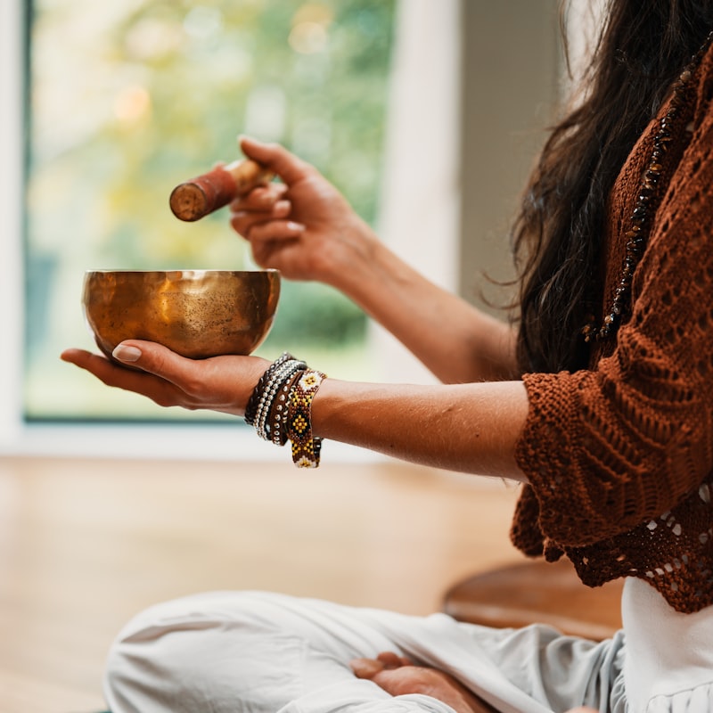 Quiet meditation corner with cushions and a single plant