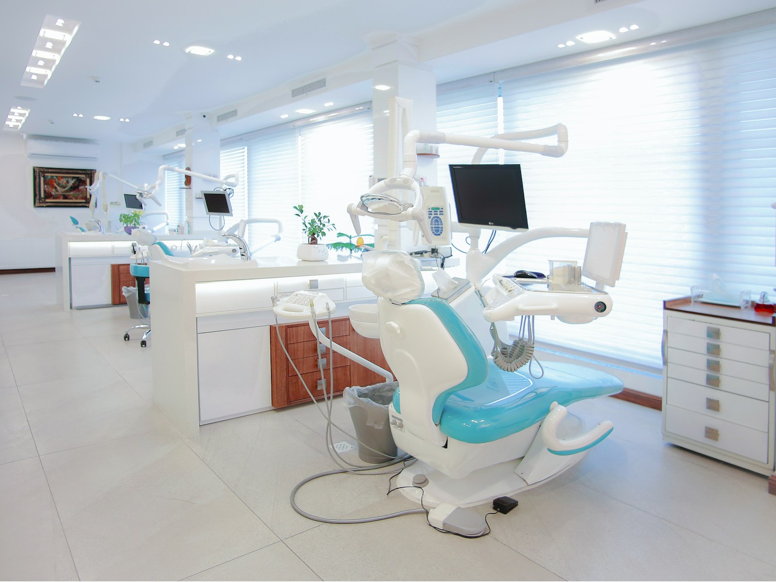 A relaxed patient smiling in a bright, modern BrightSmile Dental treatment room