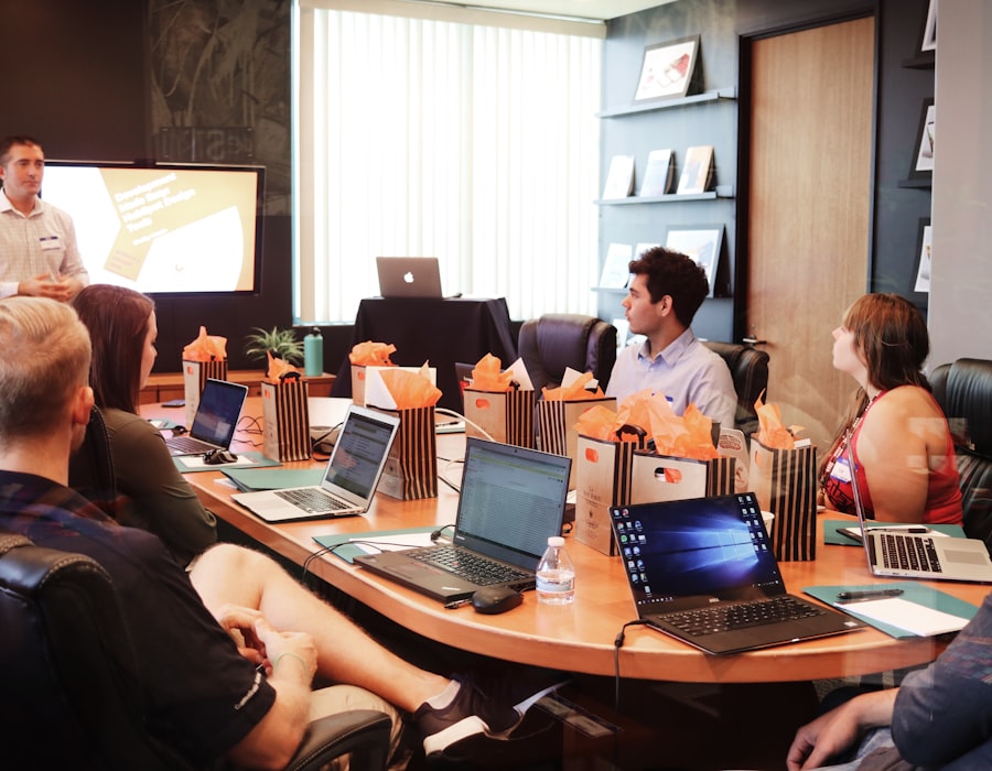 Mara presenting growth findings to a client team in a conference room
