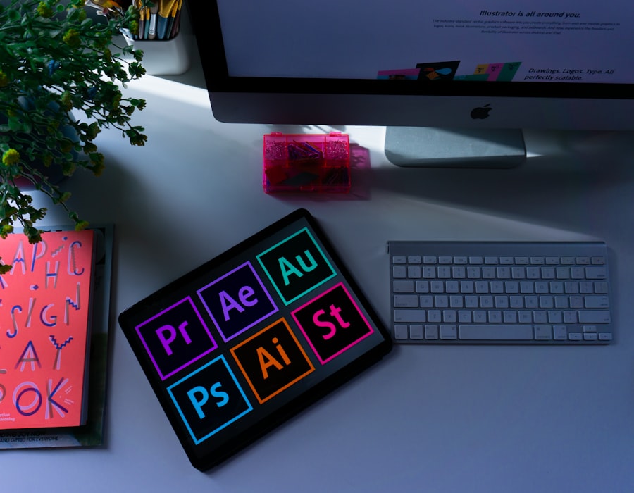 Designer desk with a tablet showing colourful creative-app icons
