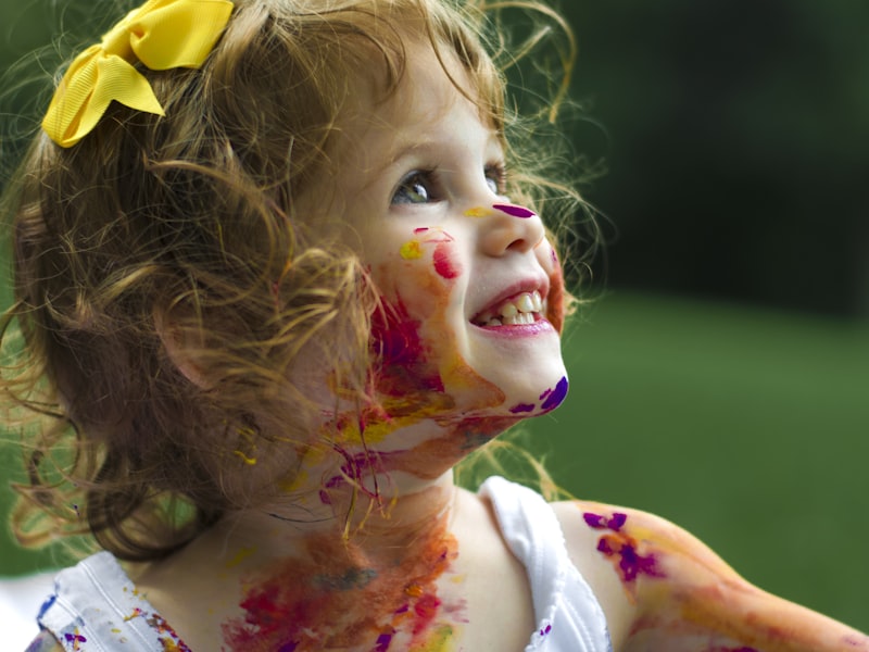 Joyful young child laughing during a kids ministry activity