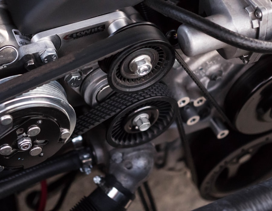 Close-up of an engine serpentine belt and pulleys during a diagnostics check