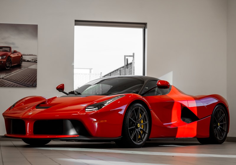 Red 2018 Ferrari 488 GTB displayed in a bright showroom