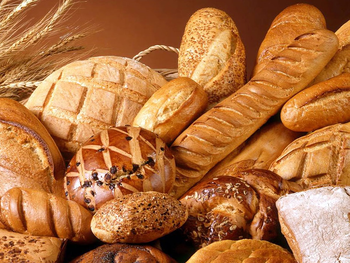 An abundant assortment of freshly baked artisan breads and rolls