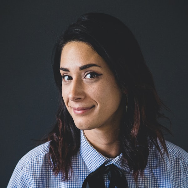 Portrait of Elena Castillo, Director of Research at OpenMind