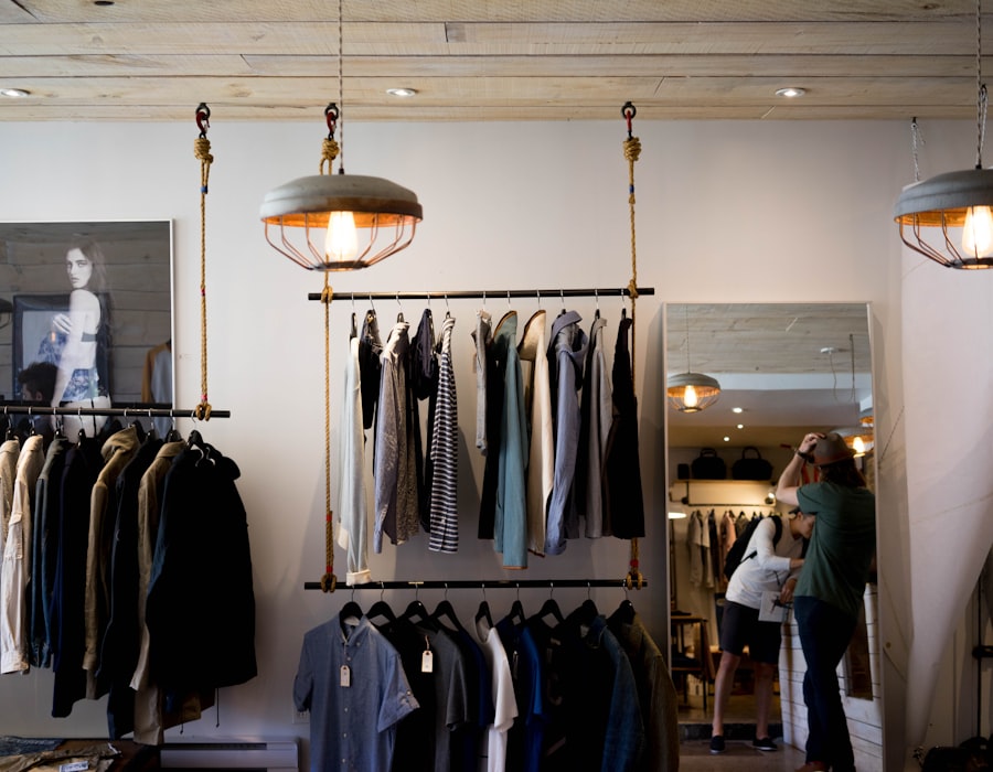 The Atelier Nord boutique interior with timber rails, soft lighting and curated rails of clothing