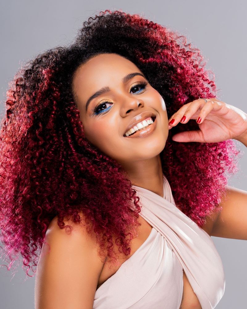 Magenta tips on natural curls