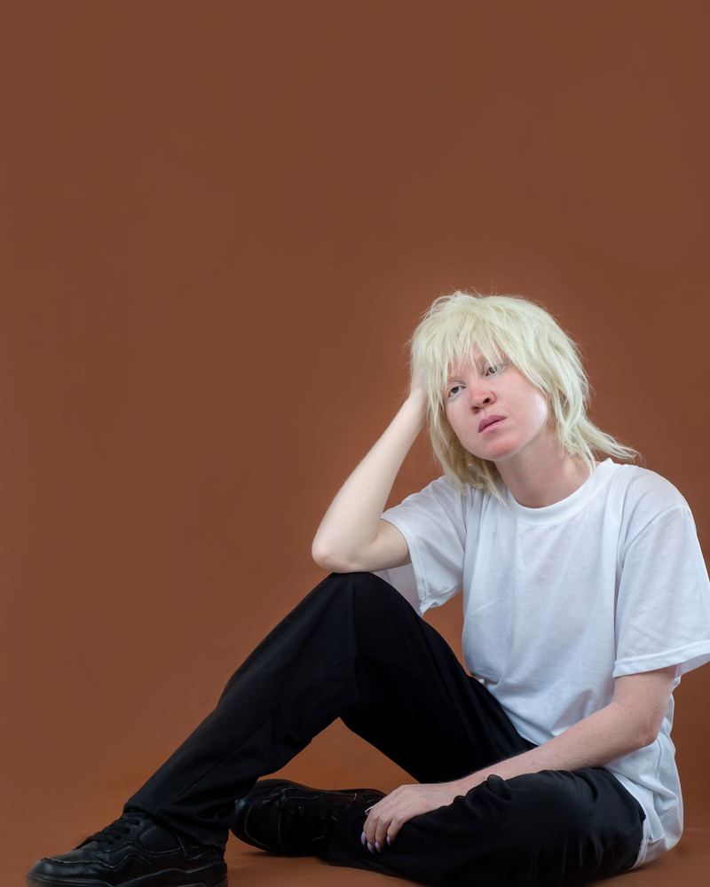 Platinum shag on a rust background