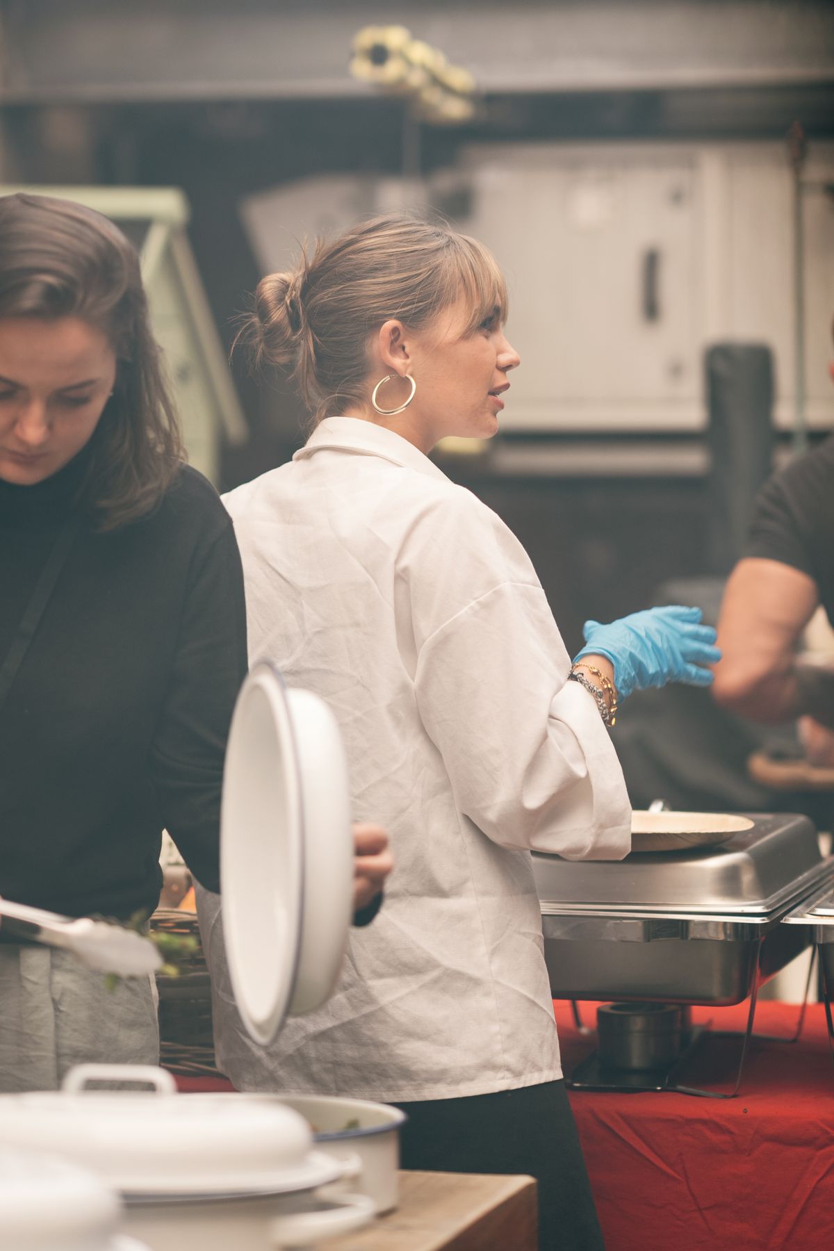 Iva Marušić working at the kitchen pass during service