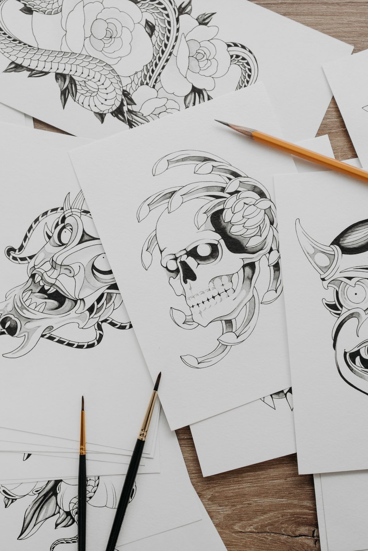Flash sheet: snake and skull drawing on paper