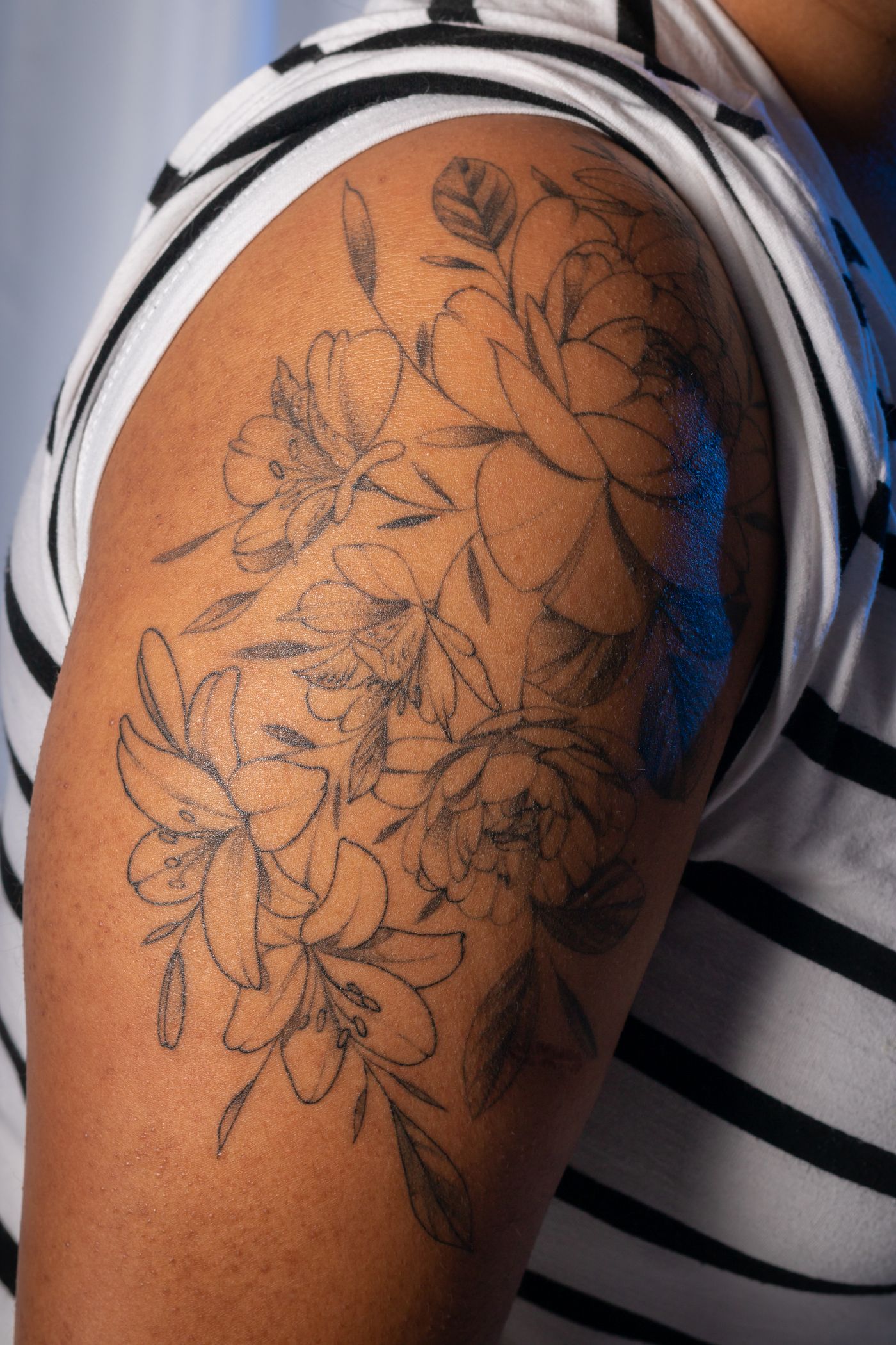 Botanical shoulder piece in thin linework